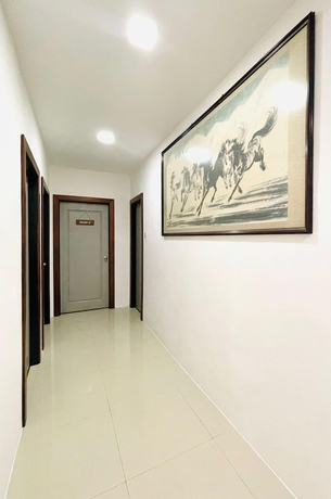 Imagen de los interiores del Hotel OYO 90928 Hi-homestay. Foto 8