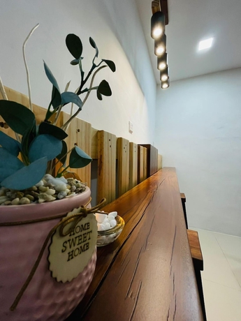 Imagen de los interiores del Hotel OYO 90928 Hi-homestay. Foto 13