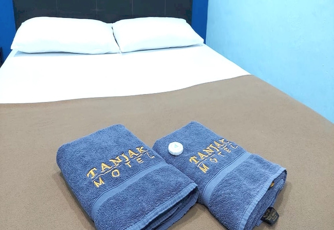 Imagen de la habitación del Hotel OYO 90937 Tanjak. Foto 2