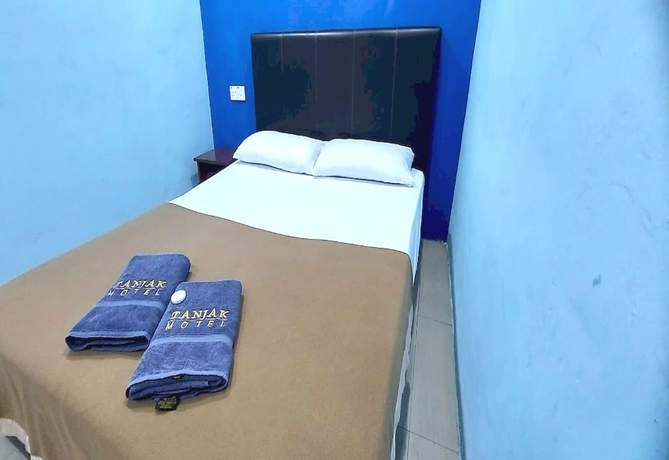 Imagen de la habitación del Hotel OYO 90937 Tanjak. Foto 3