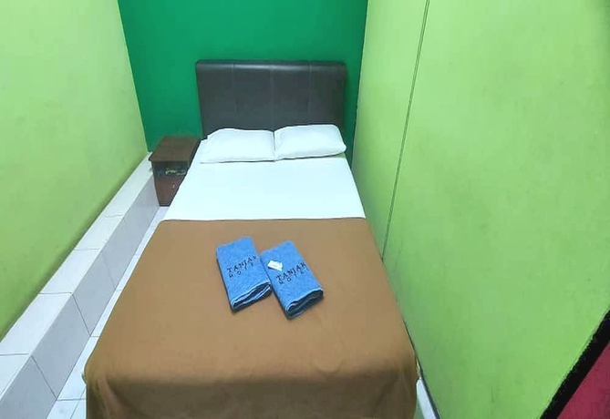 Imagen de la habitación del Hotel OYO 90937 Tanjak. Foto 8