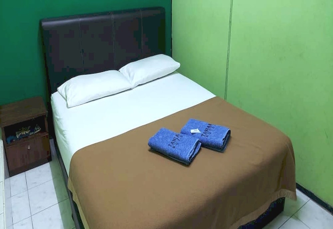 Imagen de la habitación del Hotel OYO 90937 Tanjak. Foto 9