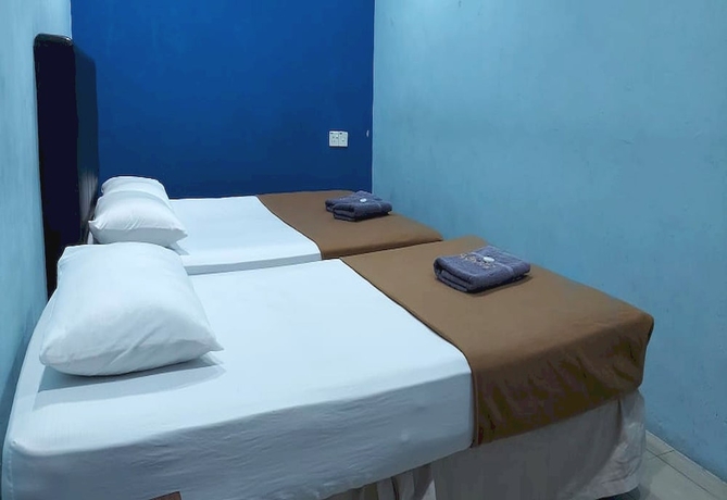 Imagen de la habitación del Hotel OYO 90937 Tanjak. Foto 13