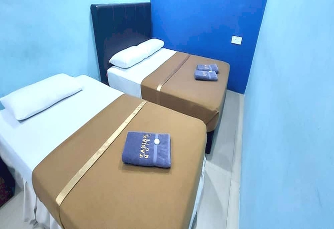Imagen de la habitación del Hotel OYO 90937 Tanjak. Foto 14