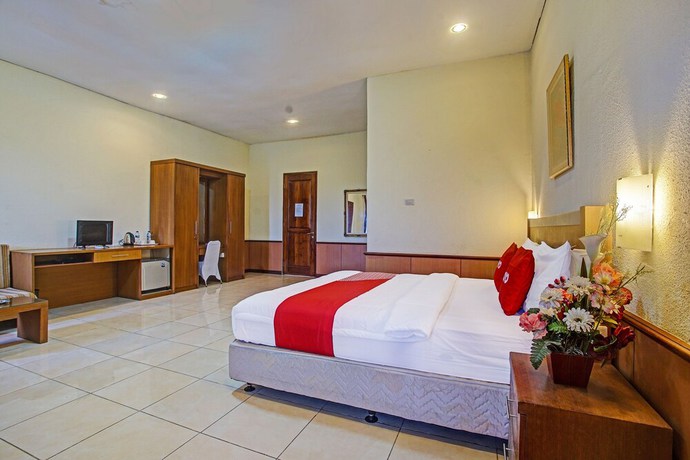 Imagen de la habitación del Hotel OYO 90947 Sarbini. Foto 3