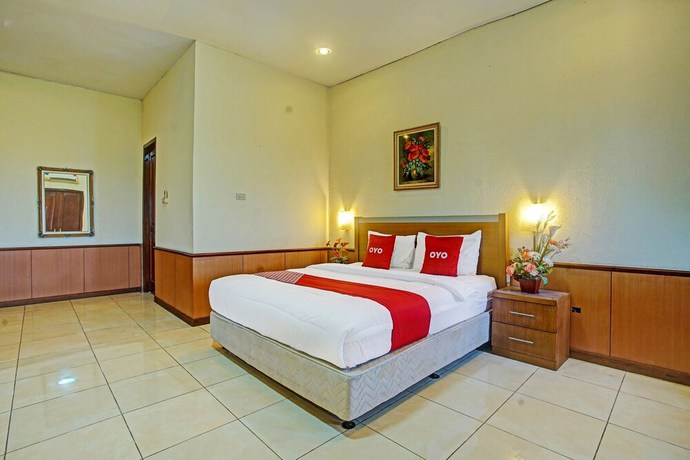 Imagen de la habitación del Hotel OYO 90947 Sarbini. Foto 5