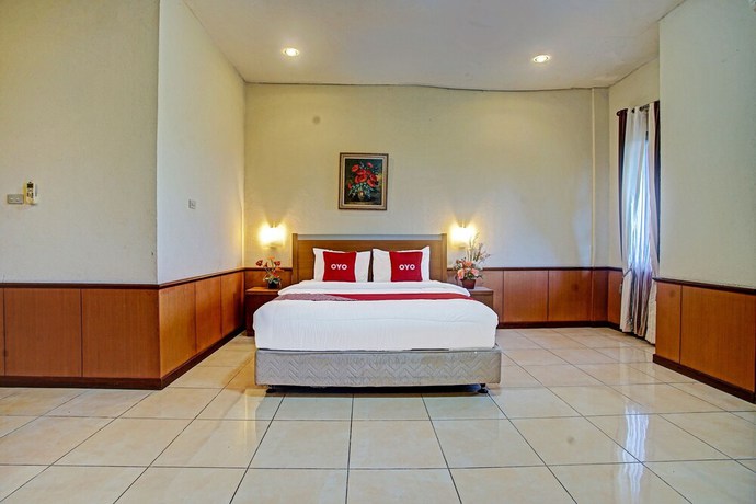 Imagen de la habitación del Hotel OYO 90947 Sarbini. Foto 6