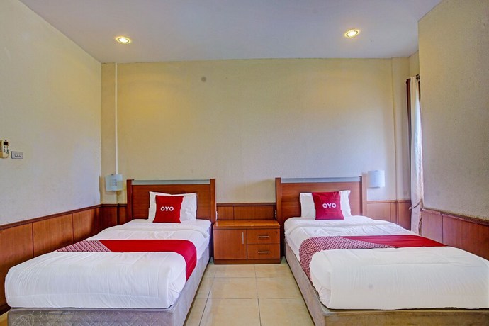 Imagen de la habitación del Hotel OYO 90947 Sarbini. Foto 10