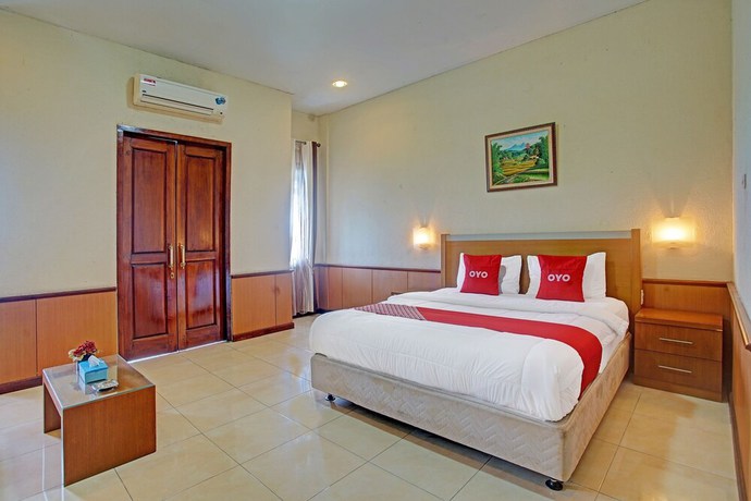 Imagen de la habitación del Hotel OYO 90947 Sarbini. Foto 13