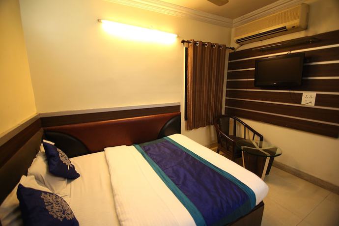 Imagen de la habitación del Hotel OYO 9095 Kanishka. Foto 8