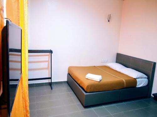 Imagen de la habitación del Hotel OYO 90963 Gest Inn. Foto 18