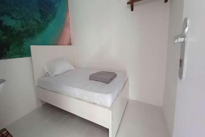 Imagen de la habitación del Hotel OYO 90974 Homestay Golo Koe Sejahtera. Foto 5