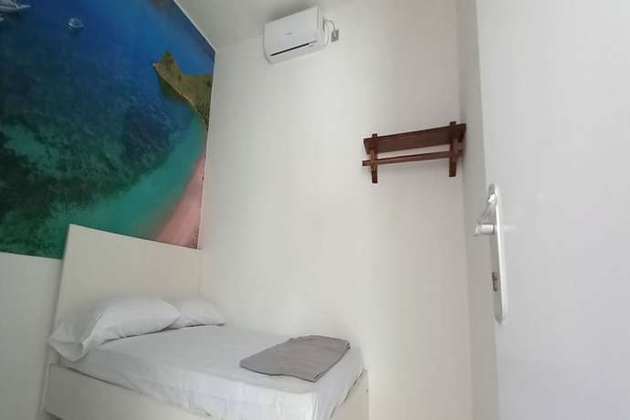 Imagen de la habitación del Hotel OYO 90974 Homestay Golo Koe Sejahtera. Foto 12