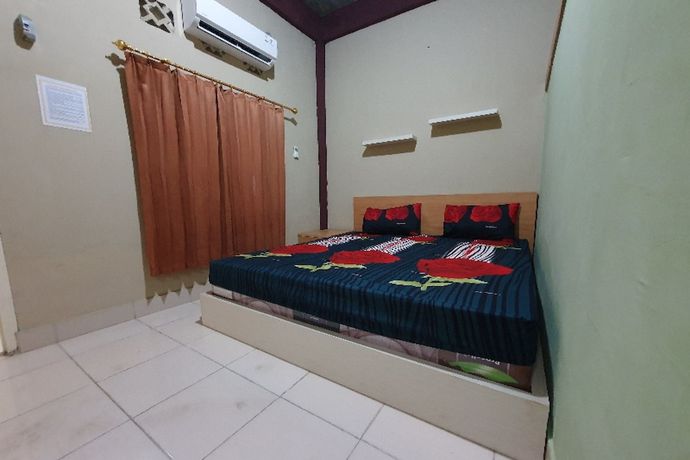 Imagen de la habitación del Hotel OYO 90976 Bagus Family Syariah. Foto 5