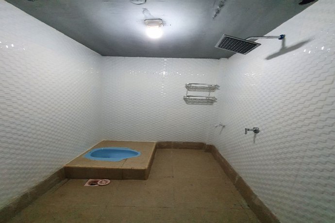 Imagen de la habitación del Hotel OYO 90976 Bagus Family Syariah. Foto 7