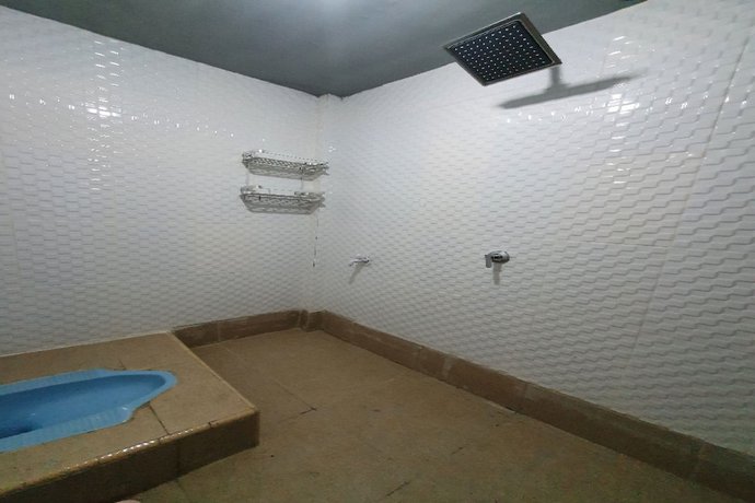 Imagen de la habitación del Hotel OYO 90976 Bagus Family Syariah. Foto 11