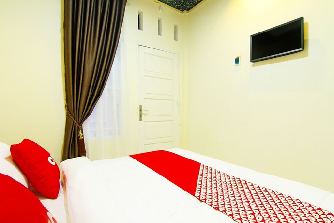 Imagen de la habitación del Hotel OYO 90978 Khalifi Guesthouse Syariah. Foto 10