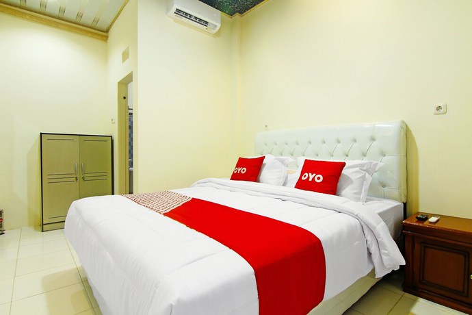 Imagen de la habitación del Hotel OYO 90978 Khalifi Guesthouse Syariah. Foto 11