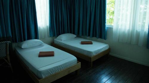 Imagen de la habitación del Hotel OYO 90980 Rainbow Island Sepanggar. Foto 19