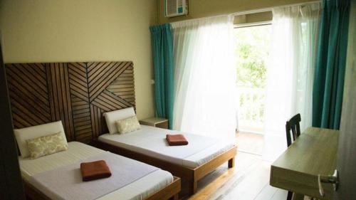 Imagen de la habitación del Hotel OYO 90980 Rainbow Island Sepanggar. Foto 20