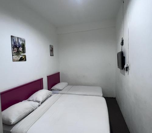 Imagen de la habitación del Hotel OYO 90999 DG HOTEL. Foto 19
