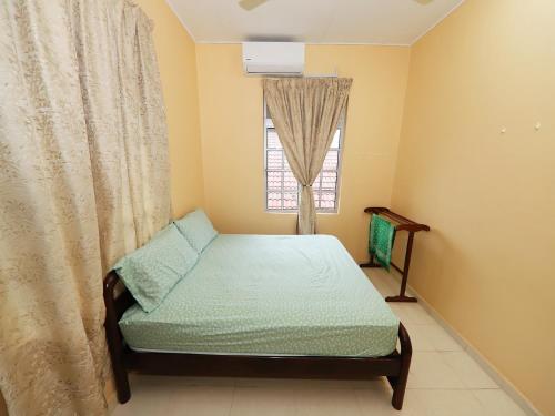 Imagen de la habitación del Hotel OYO 91004 Homestay Masjid At Taqwa (Syariah). Foto 16