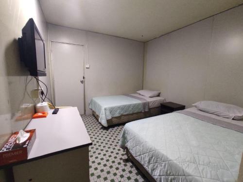 Imagen de la habitación del Hotel OYO 91020 59. Foto 15