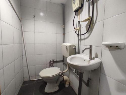 Imagen de la habitación del Hotel OYO 91020 59. Foto 16