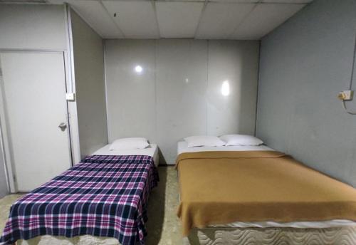 Imagen de la habitación del Hotel OYO 91020 59. Foto 18