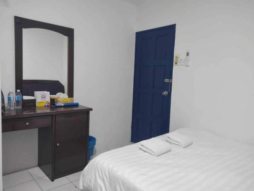 Imagen general del Hotel OYO 91033 Vaigan. Foto 6
