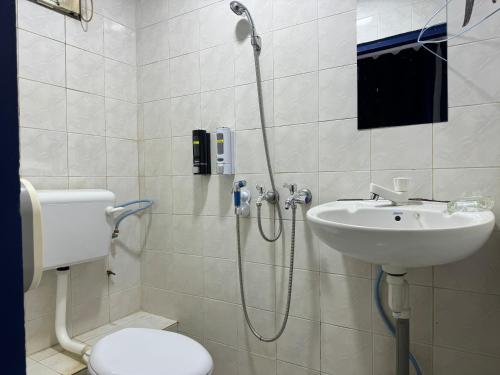 Imagen de la habitación del Hotel OYO 91033 Vaigan. Foto 17