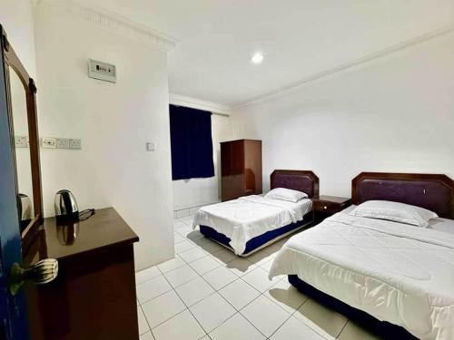 Imagen general del Hotel OYO 91033 Vaigan. Foto 9