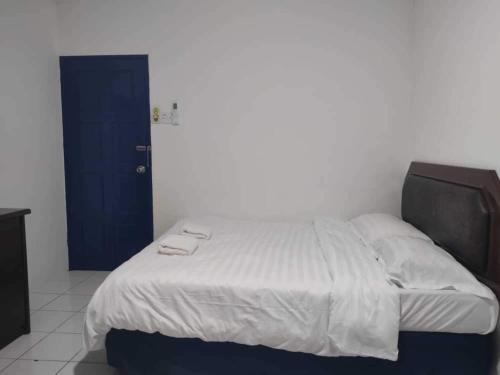 Imagen de la habitación del Hotel OYO 91033 Vaigan. Foto 18