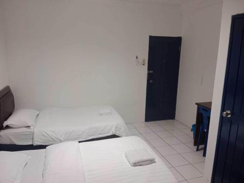 Imagen general del Hotel OYO 91033 Vaigan. Foto 10