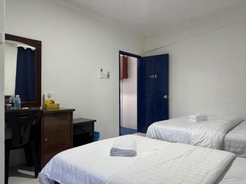 Imagen general del Hotel OYO 91033 Vaigan. Foto 11