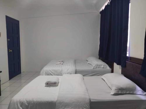 Imagen general del Hotel OYO 91033 Vaigan. Foto 13