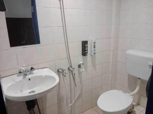 Imagen de la habitación del Hotel OYO 91033 Vaigan. Foto 20
