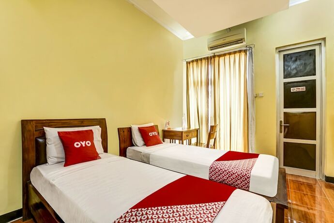 Imagen de la habitación del Hotel OYO 91036 Simpang Lima Gkpri. Foto 19