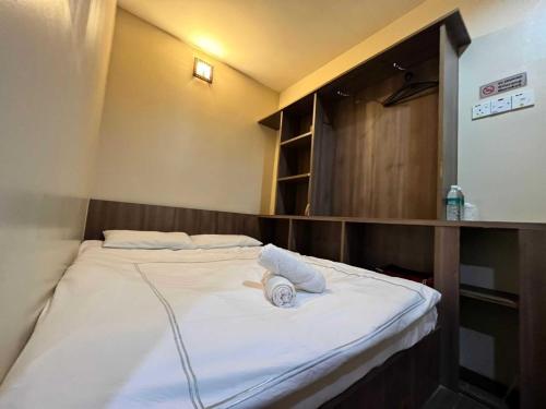 Imagen de la habitación del Hotel OYO 91040 Ezi Inn. Foto 18