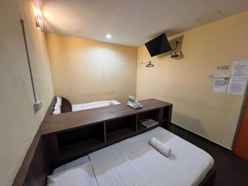 Imagen general del Hotel OYO 91040 Ezi Inn. Foto 13