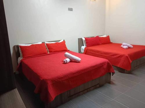 Imagen de la habitación del Hotel OYO 91040 Ezi Inn. Foto 20