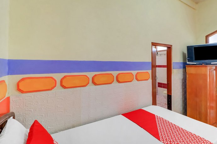 Imagen de la habitación del Hotel OYO 91042 Hawaina. Foto 2