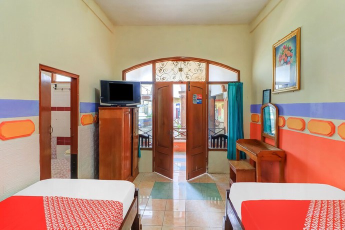 Imagen de la habitación del Hotel OYO 91042 Hawaina. Foto 5