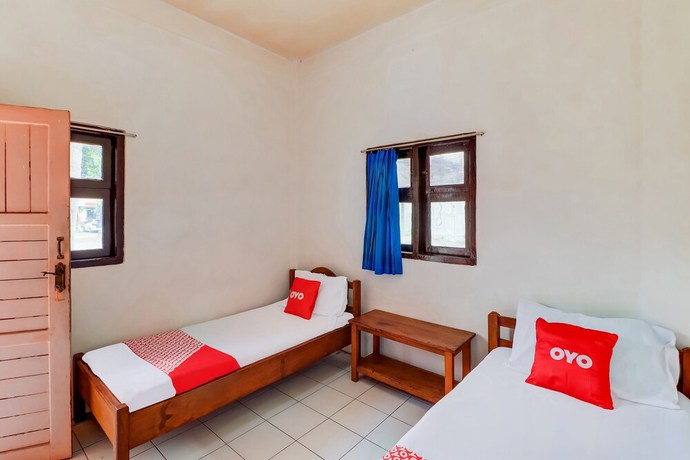 Imagen de la habitación del Hotel OYO 91042 Hawaina. Foto 6