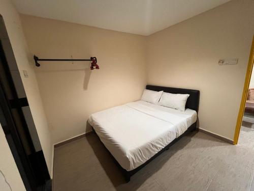 Imagen de la habitación del Hotel OYO 91044 Tampoi Sojourn. Foto 18