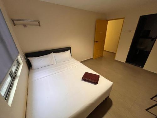 Imagen general del Hotel OYO 91044 Tampoi Sojourn. Foto 6