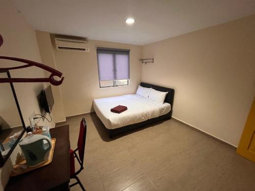 Imagen general del Hotel OYO 91044 Tampoi Sojourn. Foto 7