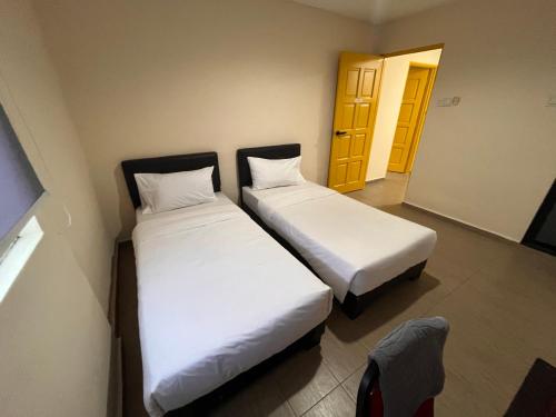 Imagen general del Hotel OYO 91044 Tampoi Sojourn. Foto 13