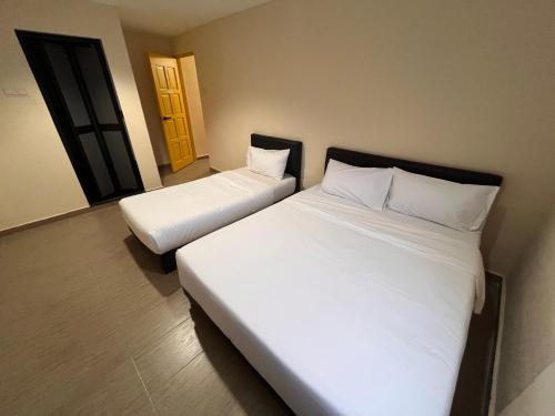 Imagen general del Hotel OYO 91044 Tampoi Sojourn. Foto 14