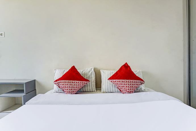 Imagen de la habitación del Hotel OYO 91045 Tower Mahakam By Toha Room. Foto 2